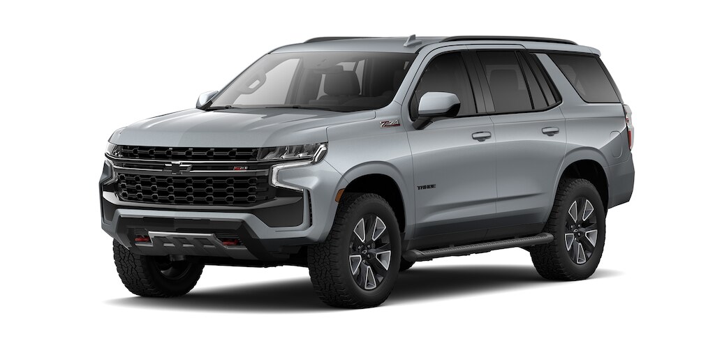 Chevrolet Tahoe 2023, SUV con 3 filas de asientos en color gris tiburon