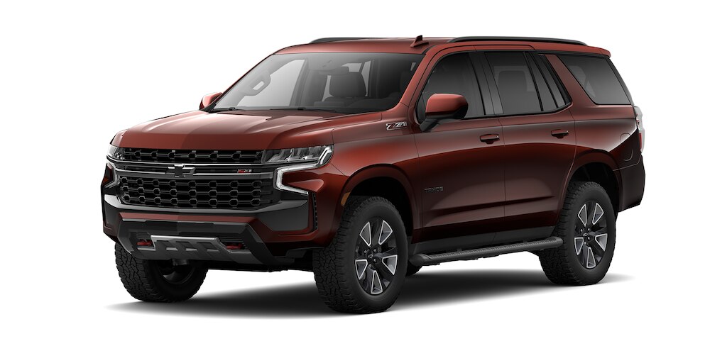 Chevrolet Tahoe 2023, SUV con 3 filas de asientos en color marrón metálico